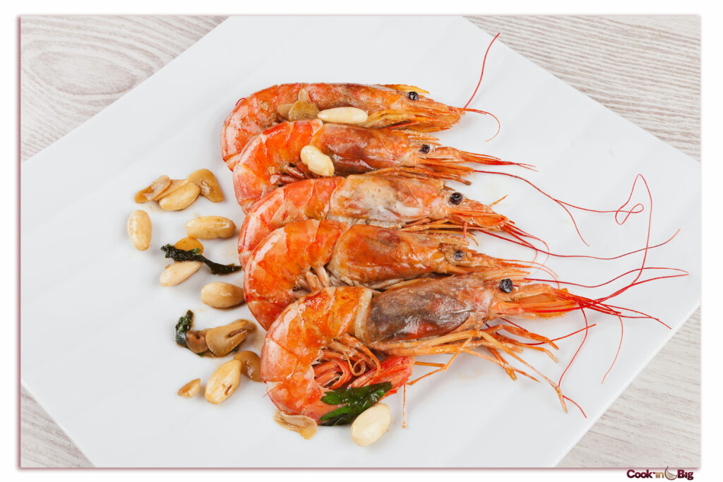Langostinos a la Plancha con Almendras, Vino Verdejo y Ajo Morado.